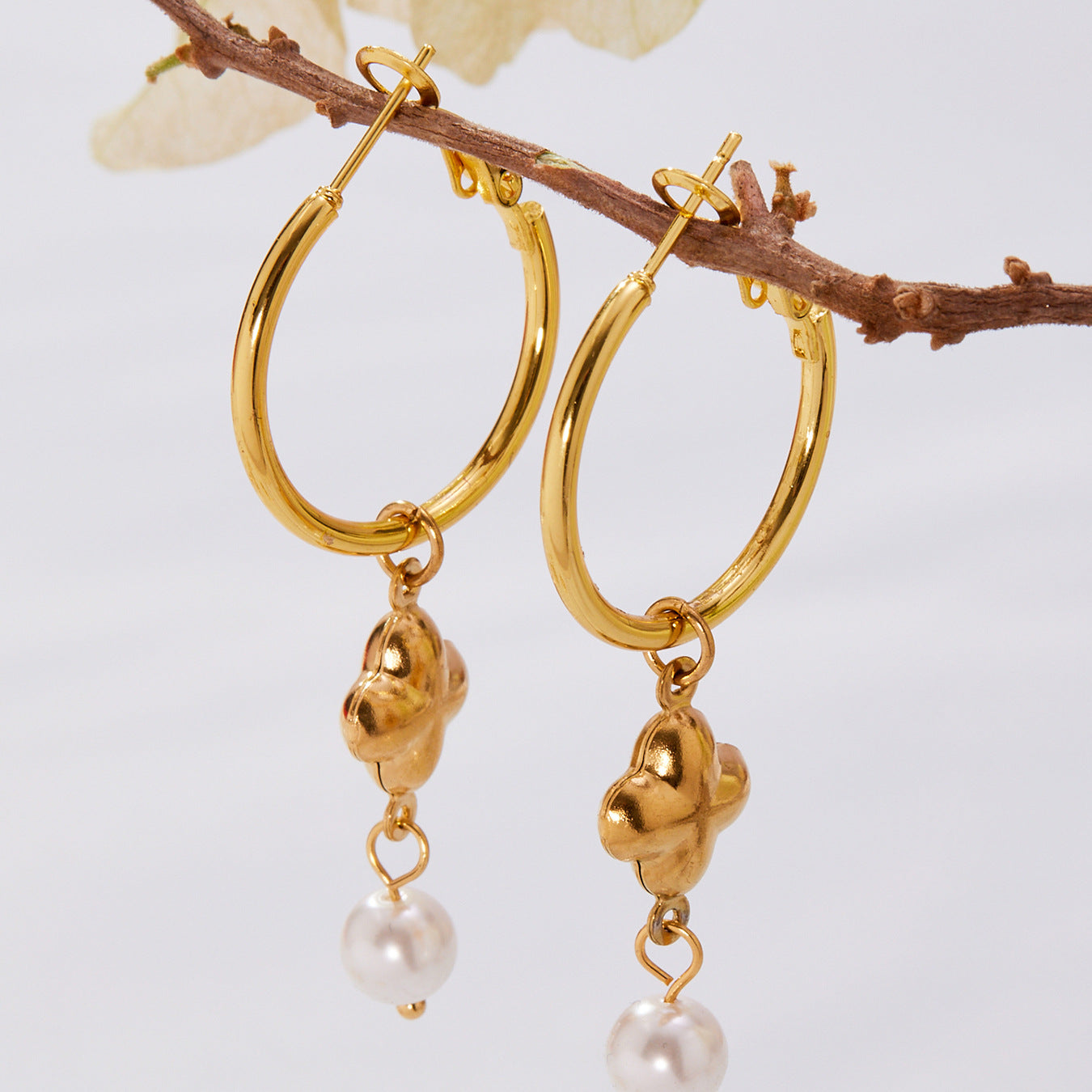 316L Stainless Steel Hollow Clover Charm Huggie Earrings - Image 1