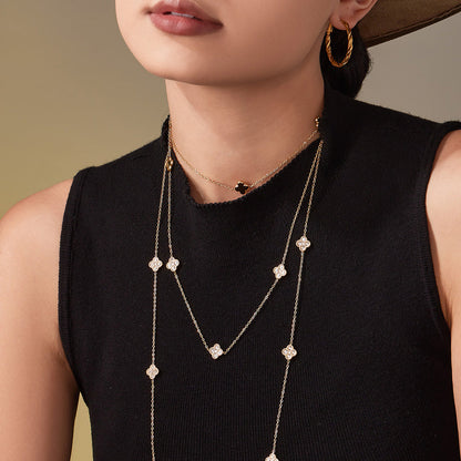 316L stainless steel layered CZ flower station necklace styling on model