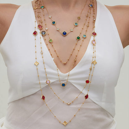 Model wearing layered 316L stainless steel glass stone necklaces