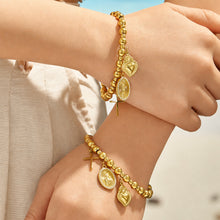 316L Stainless Steel 18K PVD Gold Multi-Pendant Bangle made with 316L stainless steel and 18K PVD gold finish for wholesale jewelry buyers - image 9