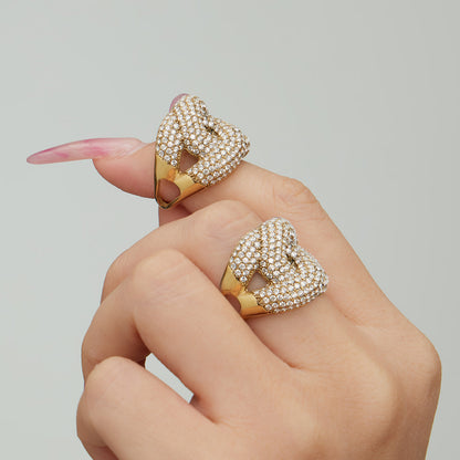 Gold tone 316L stainless steel pavé zircon open ring A387 on hand close up for boutique collections