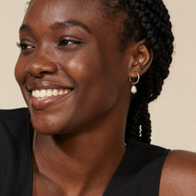 316L stainless steel freshwater pearl hoop earrings close up showing smooth hoop finish and pearl luster 18K PVD gold