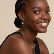 316L stainless steel freshwater pearl hoop earrings worn on model small gold hoops with pearl drop elegant everyday style