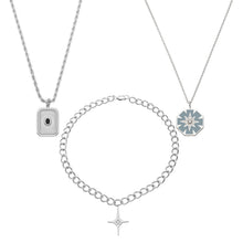 Three 316L stainless steel pendant necklaces in square, starburst and four-point cross designs