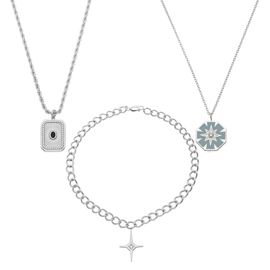 Three 316L stainless steel pendant necklaces in square, starburst and four-point cross designs