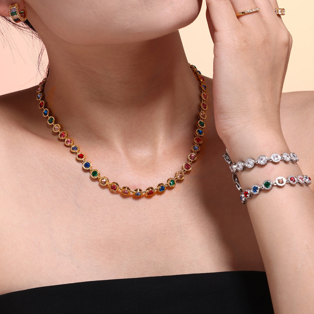 316L stainless steel PVD Plated Rainbow 3A Zircon Paved Bracelet & Necklace Collection flat lay display for wholesale necklace buyers