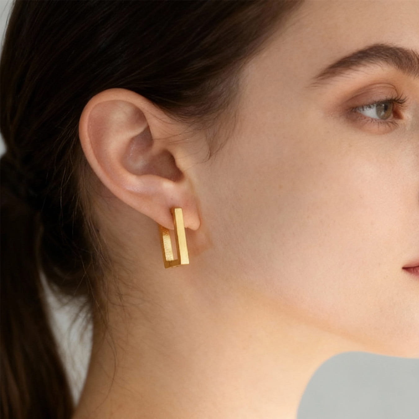 316L stainless steel rectangular huggie hoop earrings gold finish on ear minimalist style