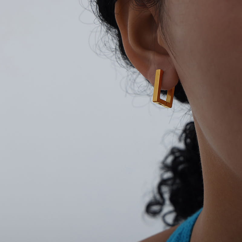 316L stainless steel rectangular huggie hoop earrings side view on model modern look