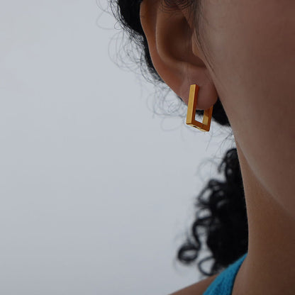 316L stainless steel rectangular huggie hoop earrings side view on model modern look