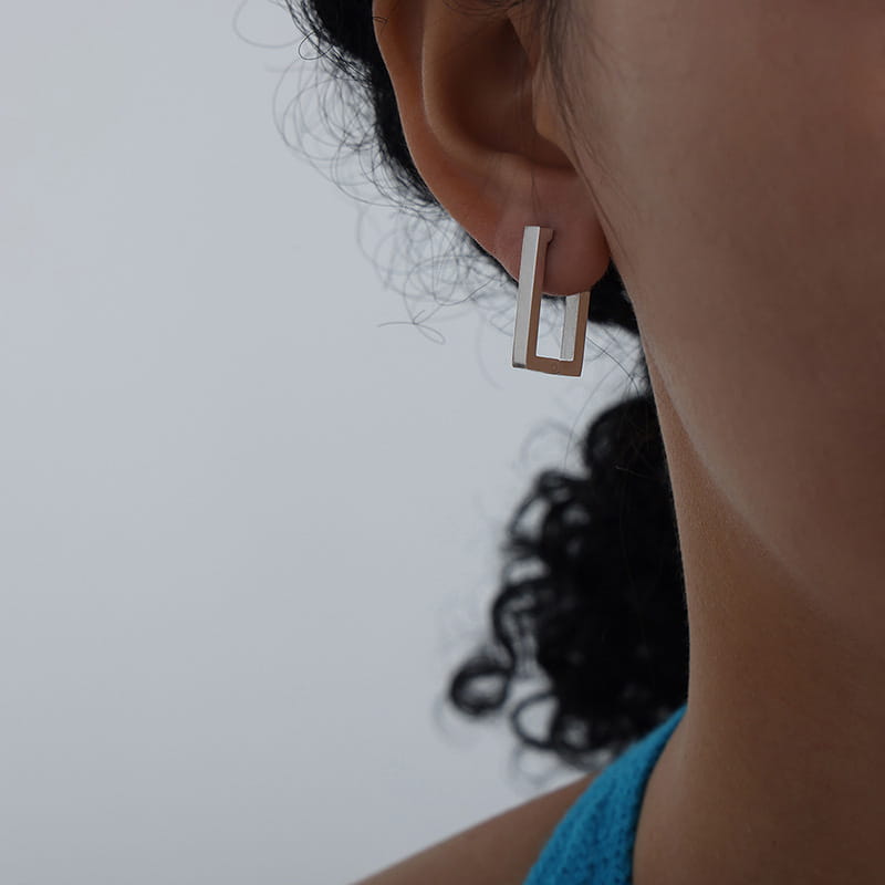 316L stainless steel rectangular huggie hoop earrings silver tone on ear