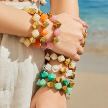 Pink gold resin bracelet with stainless steel accents