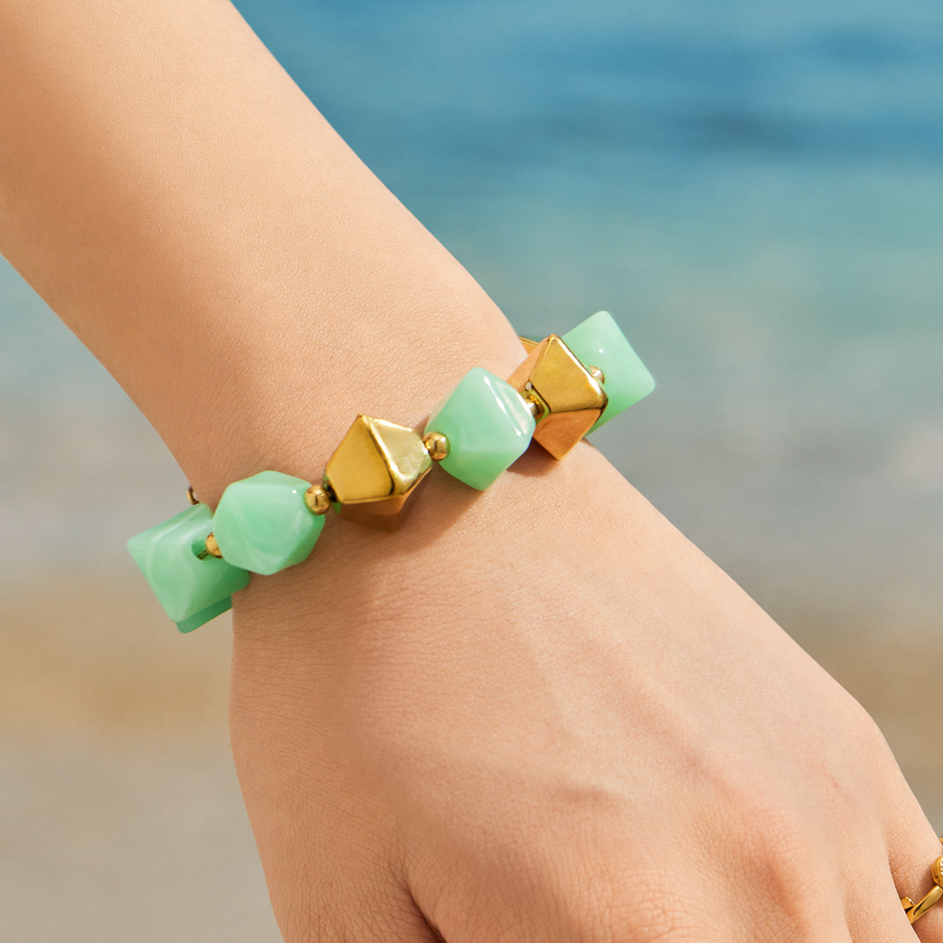 Yellow resin bracelet with stainless steel accents