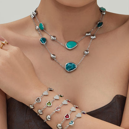 316L stainless steel resin stone necklace paired with glass heart charm bracelets stacked for wholesale display