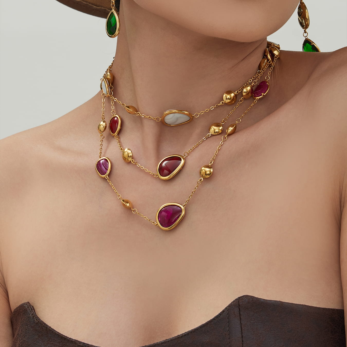 Side view of 316L stainless steel resin stone necklace with 18K PVD gold plating