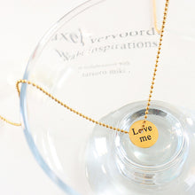Close-up of the 18K PVD gold necklace detail