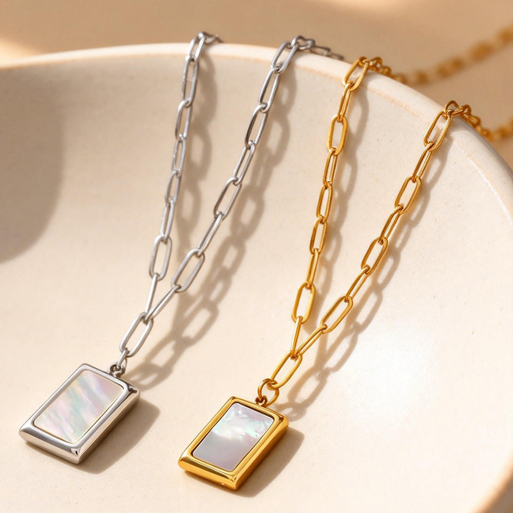 Gold and silver tone 316L stainless steel seashell rectangle pendant necklaces flat lay comparison