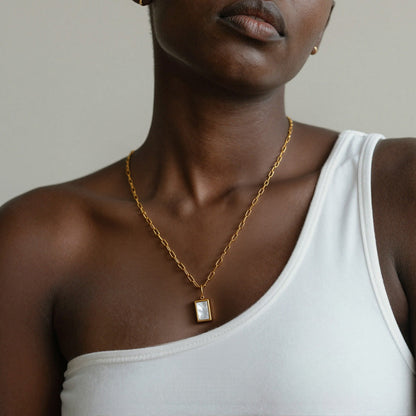 18K PVD gold 316L stainless steel seashell rectangle pendant necklace worn on model