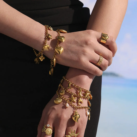 Beach model styling layered 18K PVD gold shell pearl charm anklet and matching bracelet set for summer resort jewelry display