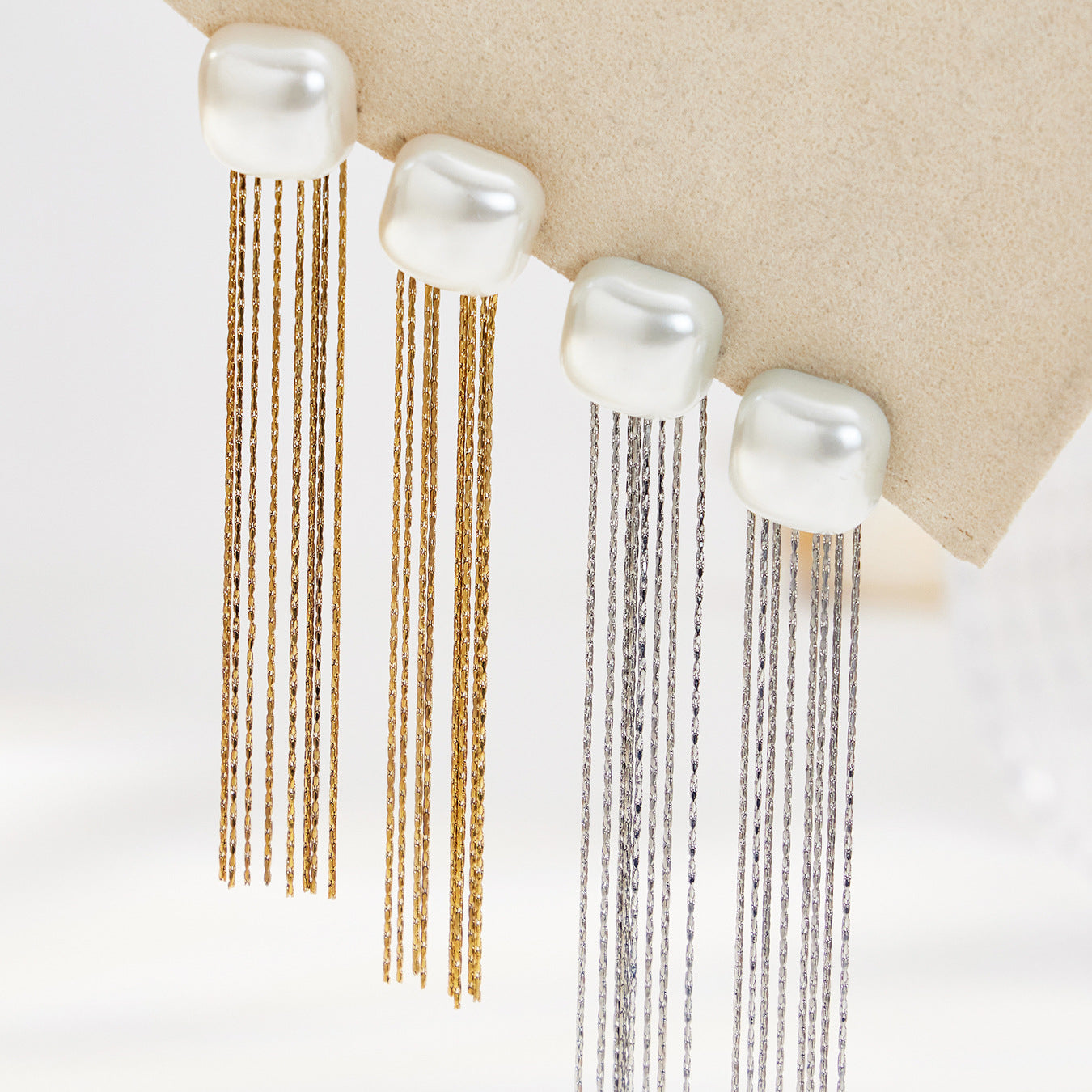 316L stainless steel shell bead tassel drop earrings set in gold and steel tones for wholesale