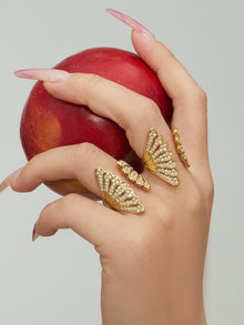 Model wearing 316L stainless steel shell zircon open ring with 18K PVD gold plating