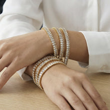 Close-up of the 18K PVD gold finish on the stainless steel bracelet