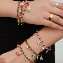 Close-up snowflake charm holiday beaded bracelet