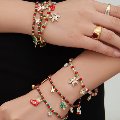 Close-up snowflake charm holiday beaded bracelet