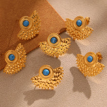 Turquoise peacock fan earrings flat lay for resort and vacation jewelry displays