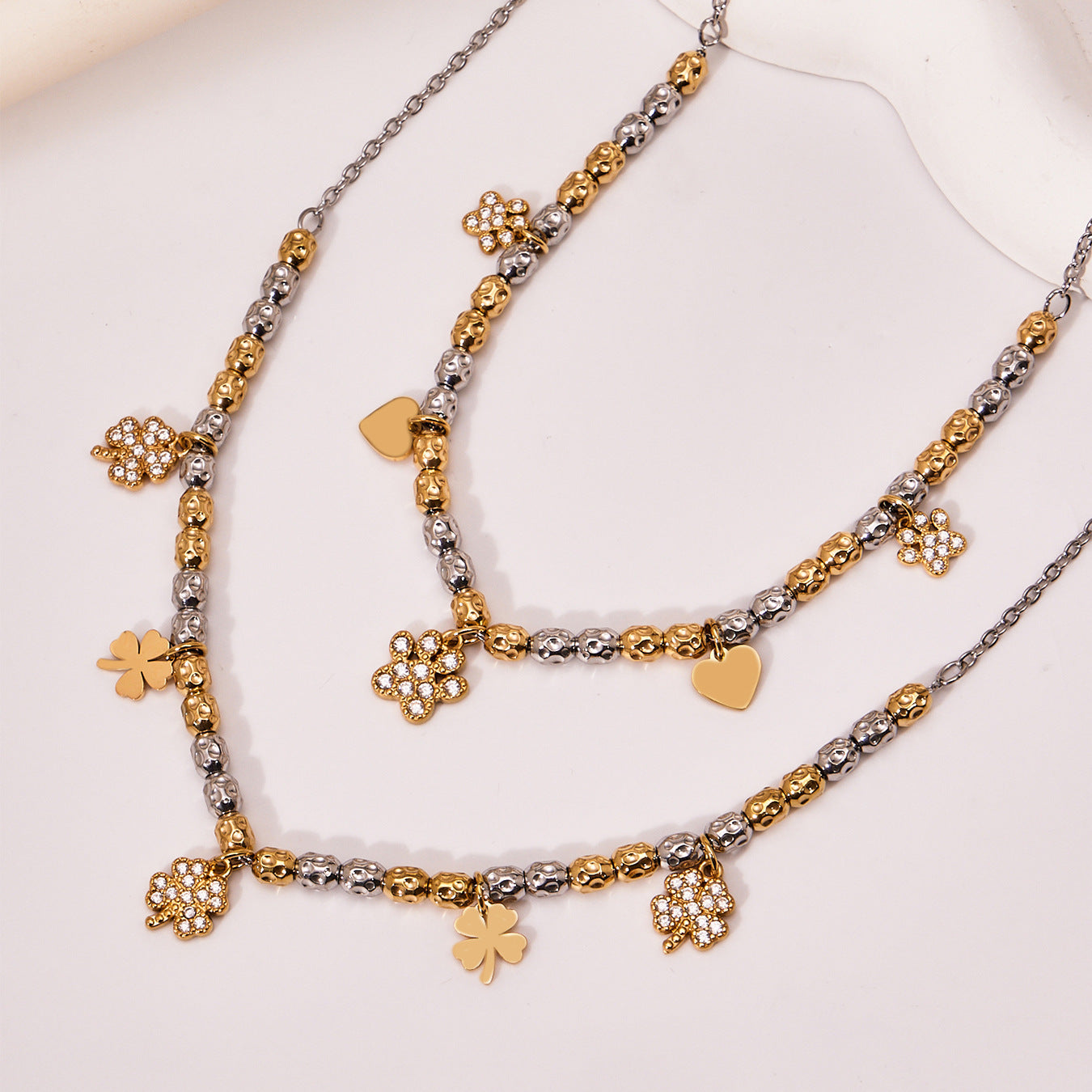 316L Stainless Steel Two-Tone Plated Four-Leaf Clover CZ Charm Bracelet & Necklace - Image 1