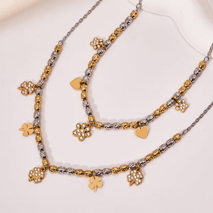316L Stainless Steel Two-Tone Plated Four-Leaf Clover CZ Charm Bracelet & Necklace - Image 1