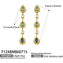 Striking red zircon waterdrop earrings in gold