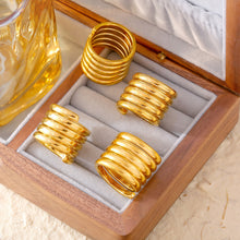 Multi-layer wrapped wide ring in gold