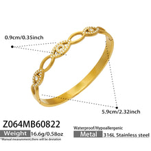 Stylish zircon eye bangle in gold color