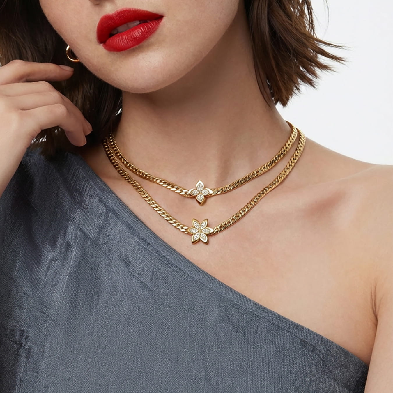 Layered styling of 316L stainless steel zircon flower necklaces with gold PVD finish