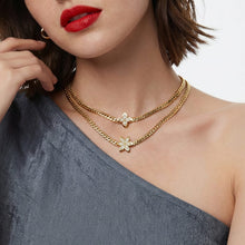 Layered styling of 316L stainless steel zircon flower necklaces with gold PVD finish