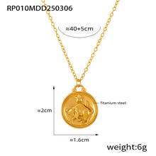 Gold Taurus zodiac medallion necklace made of 316L stainless steel with embossed bull motif