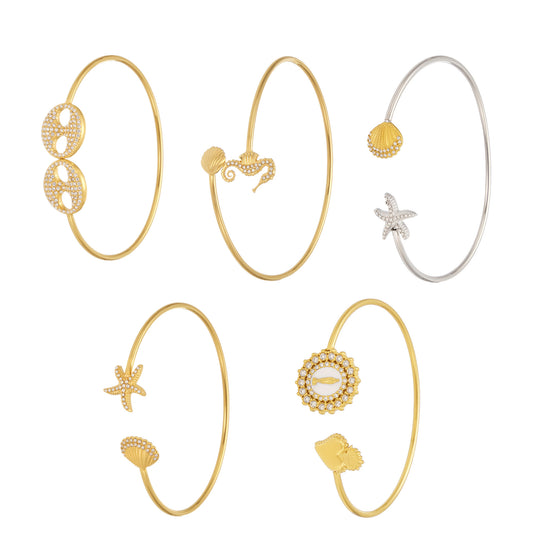 5A zircon paved ocean bangle set (shell/starfish/seahorse designs) on white background, luxury jewelry collection