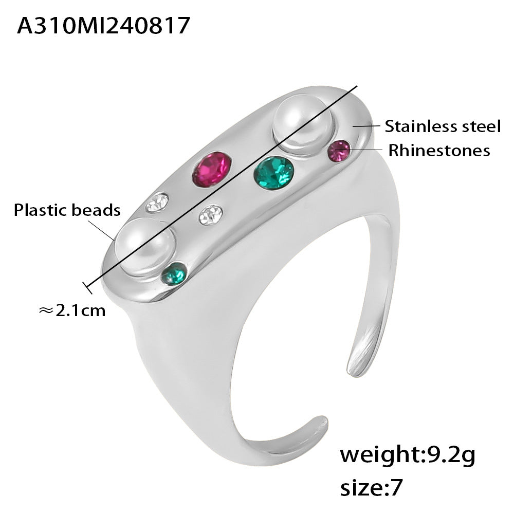 A310 steel pearl rhinestone open ring size card showing stainless steel material, rhinestones, plastic beads and size 7