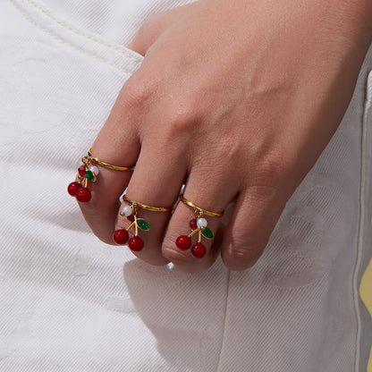 18k gold plated enamel red cherry ring on finger: oil drip design