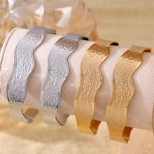 Gold & silver wave texture open bangle set display, mixed-color stackable jewelry
