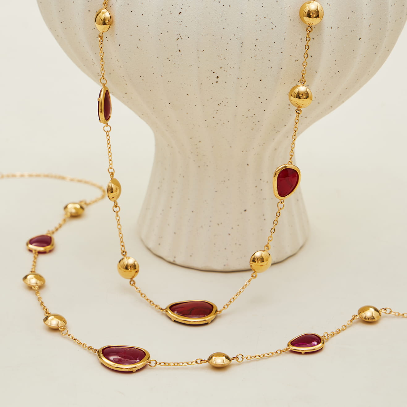 Red glass stone necklace crafted from 316L stainless steel with 18K PVD gold plating