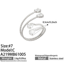 Size guide for the A219 steel-tone stainless steel twisted open ring with clear teardrop stones, showing size 7