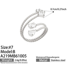 Size guide for the A219 steel-tone stainless steel square-stone twisted open ring, showing size 7 and accent measurements