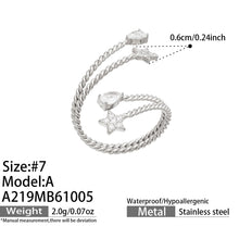Size guide for the A219 steel-tone stainless steel star-accent twisted open ring, showing size 7 and accent measurements