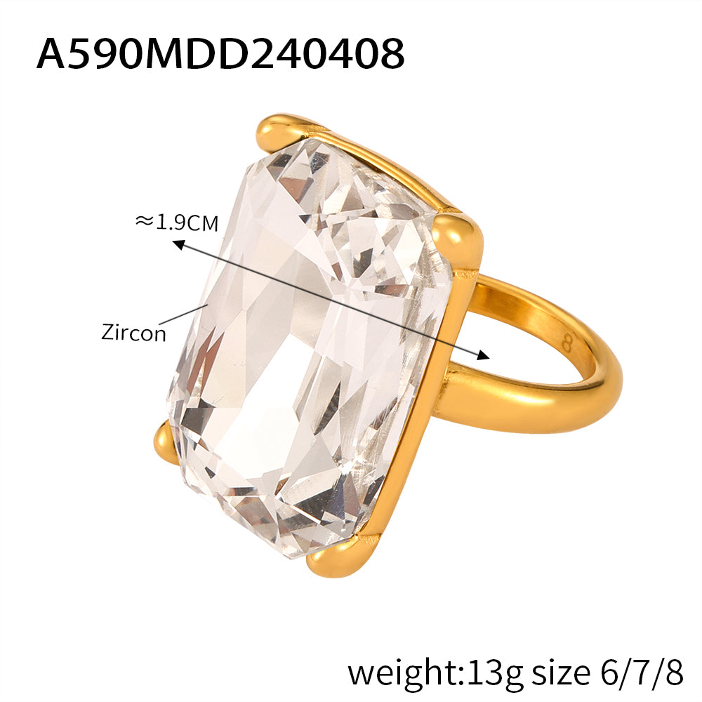 A590 clear rectangular stone cocktail ring in gold tone with supplier size and weight details