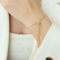 E142 Gold Pearl Drop Slider Bracelet 24cm