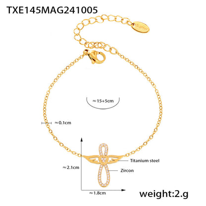 Gold PVD angel wing CZ charm bracelet in stainless steel, 15+5cm extender, waterproof daily wear.