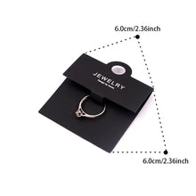 Black ring display card showing 6 × 6 cm size and product specification details