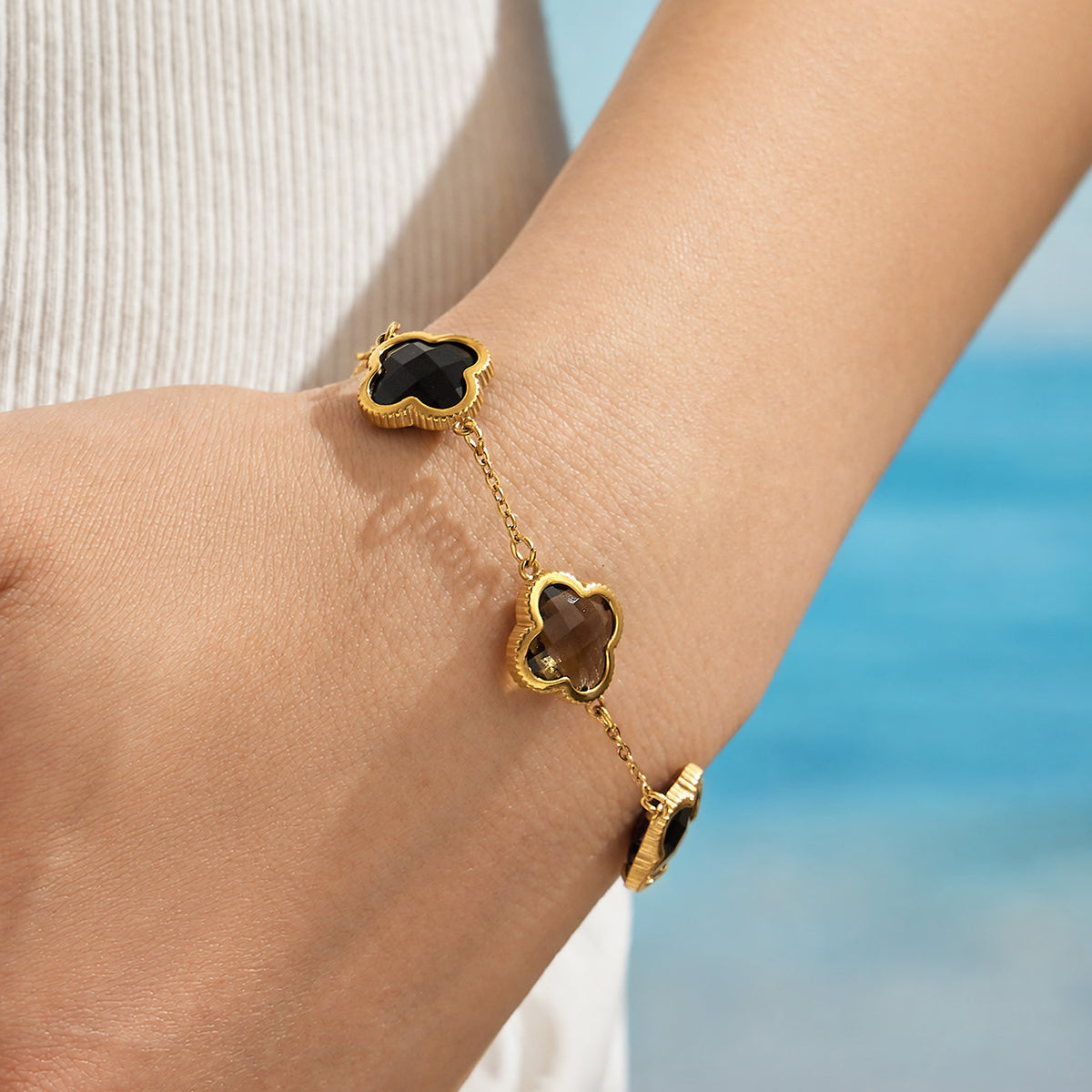 Black clover zircon bracelet worn on wrist