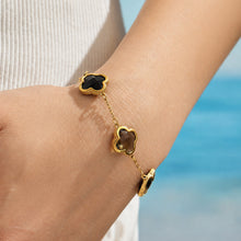 Black clover zircon bracelet worn on wrist